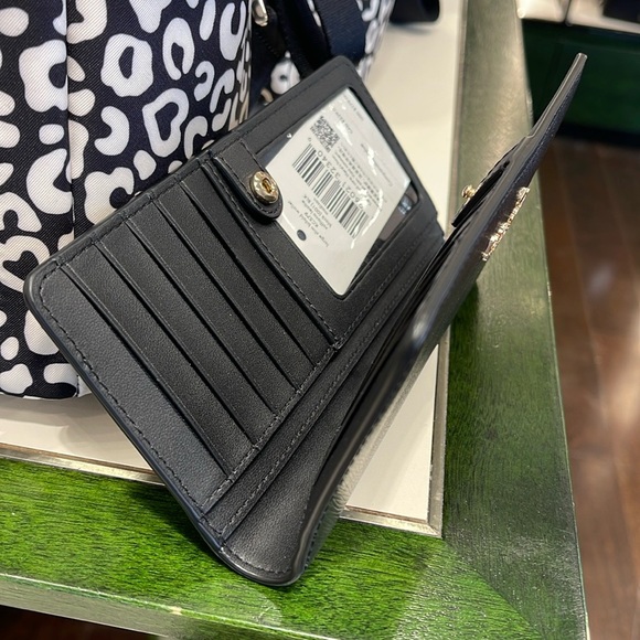 Kate Spade Madison Large Slim Bifold Wallet
Black 
NWT - Picture 10 of 16